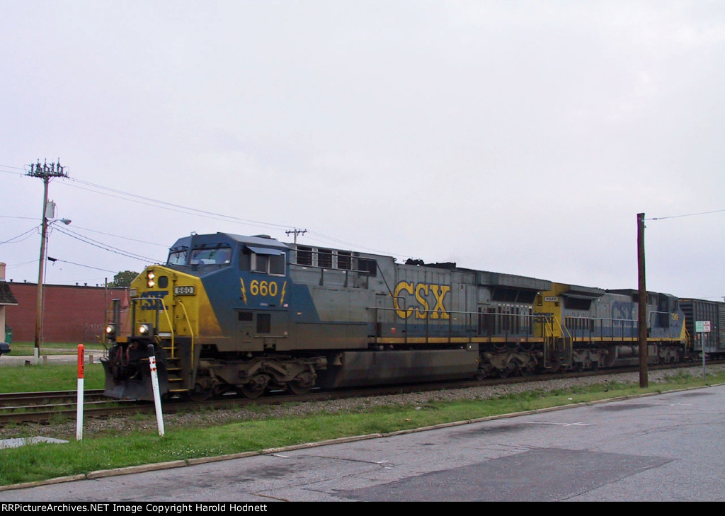 CSX 660 & 7349 lead a southbound train thru town